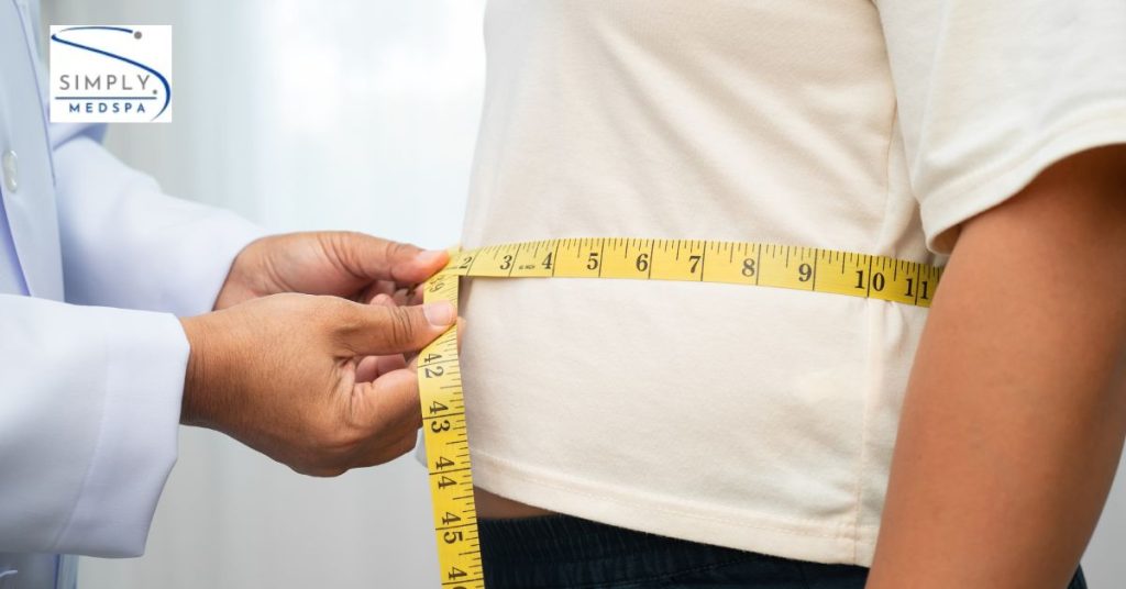 Simply MedSpa provider explaining muscle toning and fat reduction options